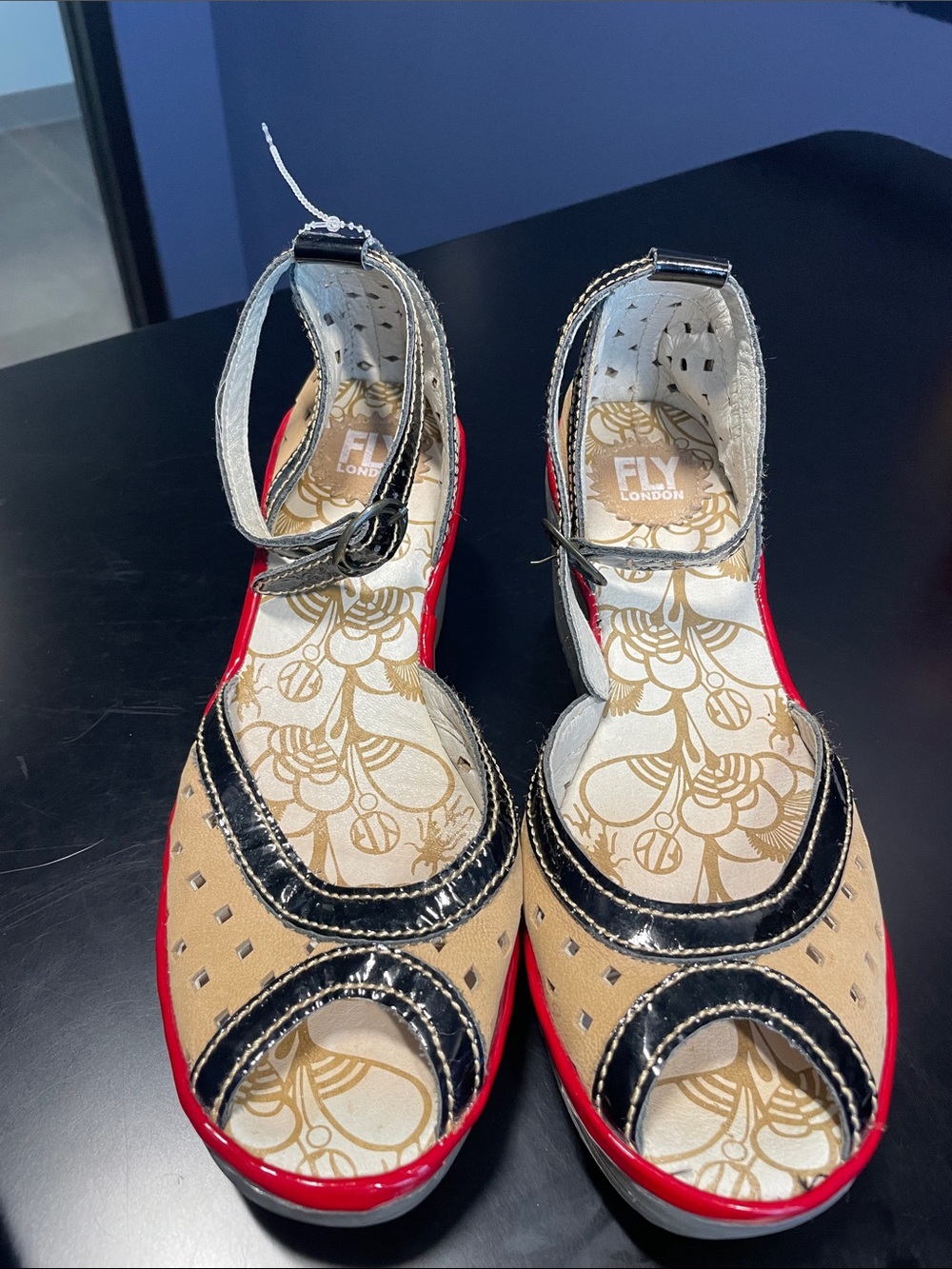 FLY London Beige and Black Peep-Toe Wedges with Red Trim